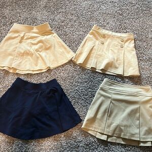 Lot of childrens place school uniforms